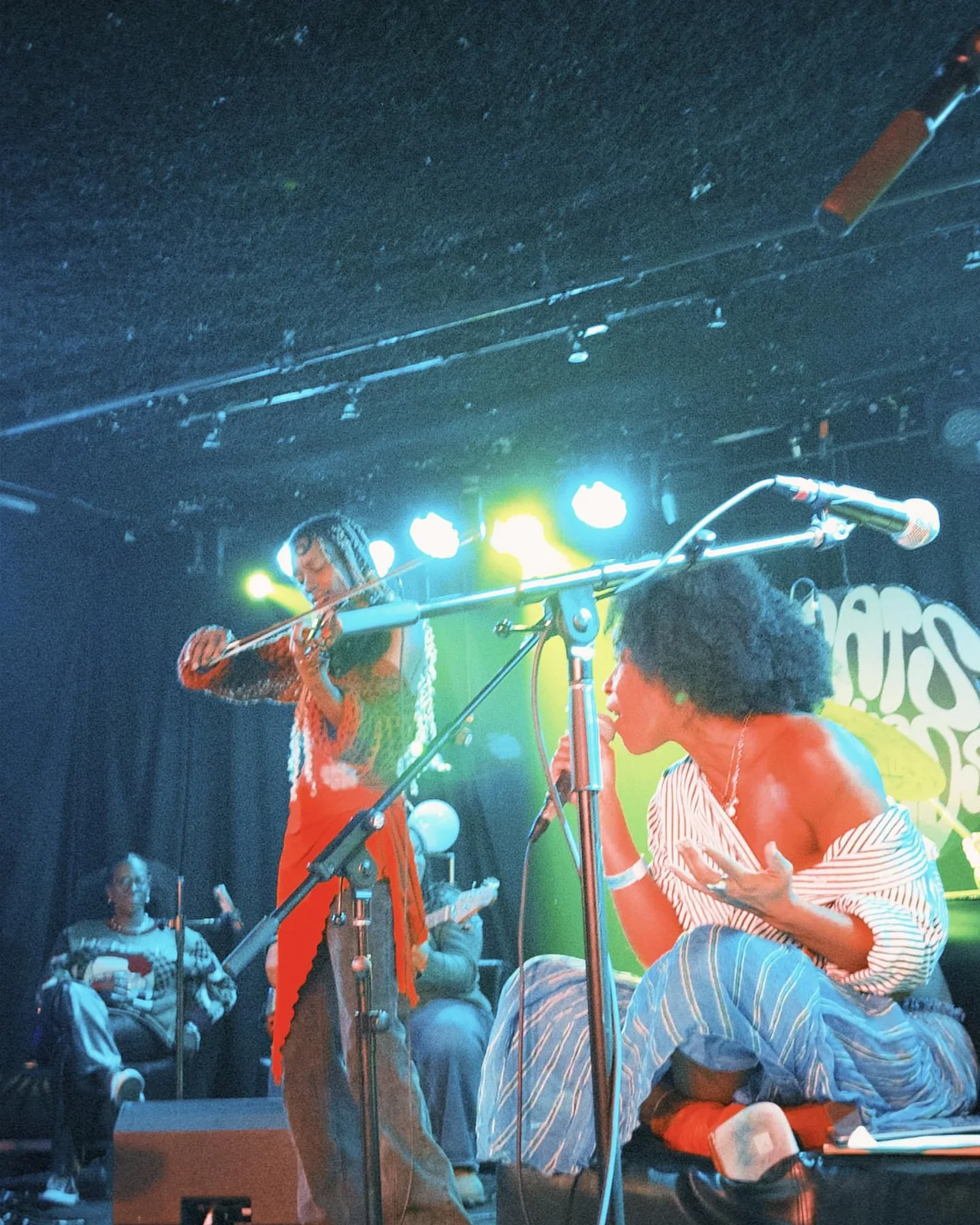 Live performers on stage at Beats and Ballads